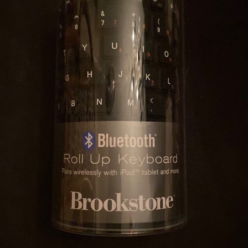 Never used- Brookstone Bluetooth roll up keyboard!